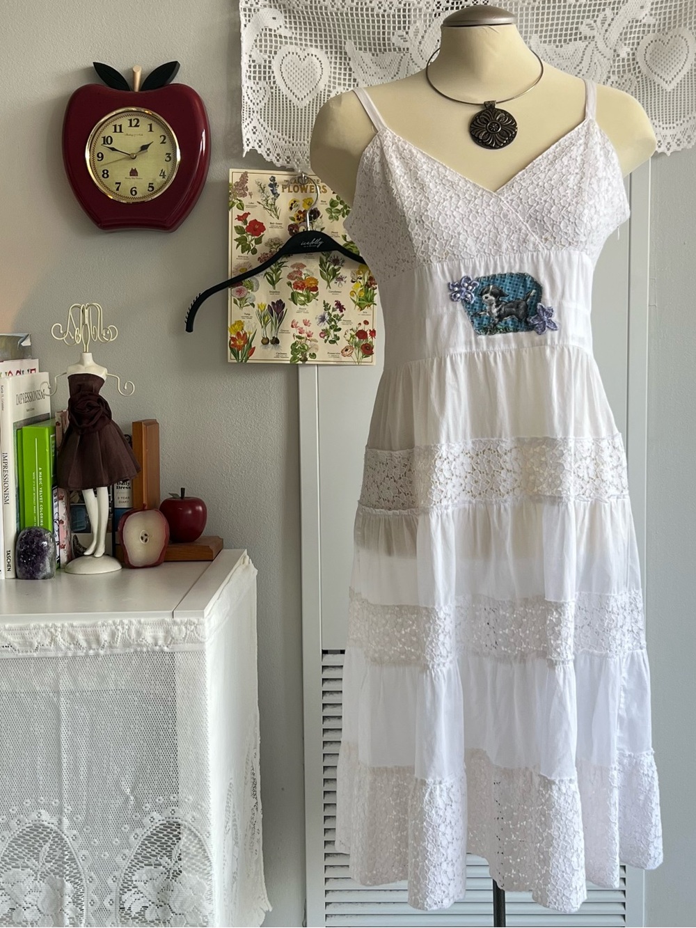 White lace midi dress with dog appliqué and pearl details